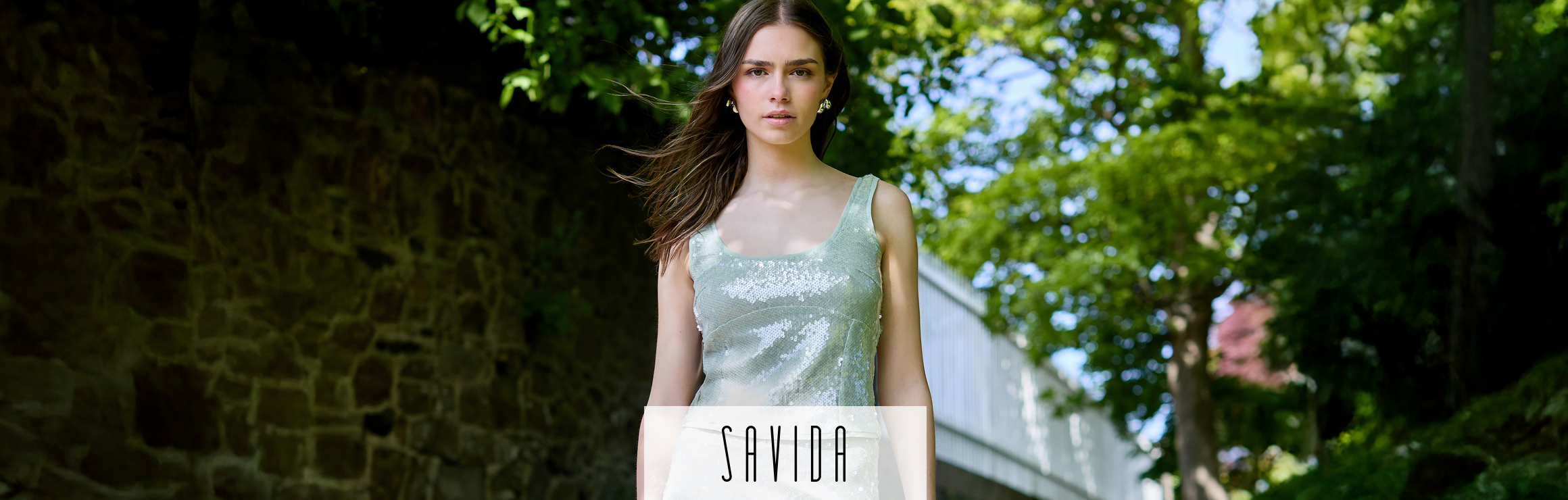 Featured Savida sleeveless neutral suit – summer flattering styles