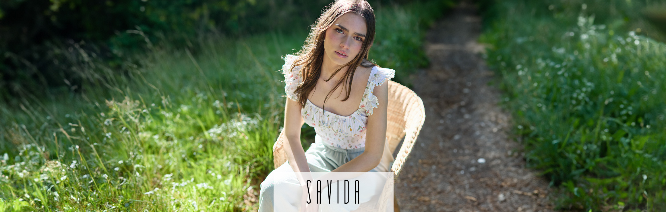 Featured Savida sleeveless neutral suit – summer flattering styles