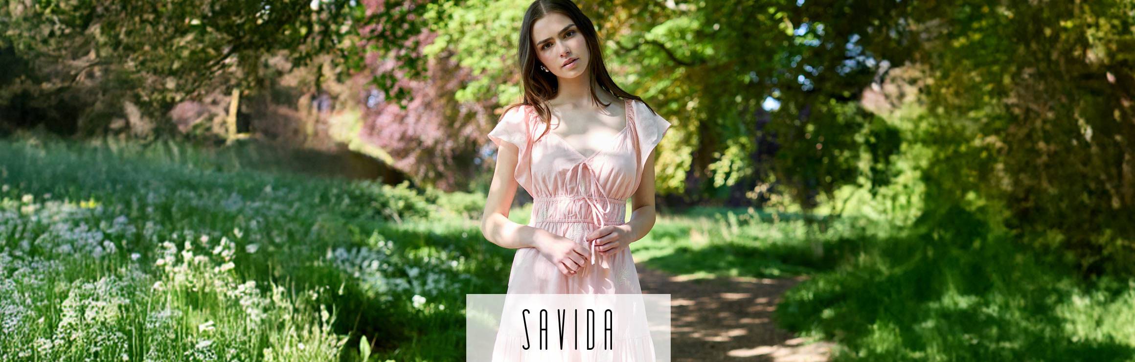 Featured Savida sleeveless neutral suit – summer flattering styles