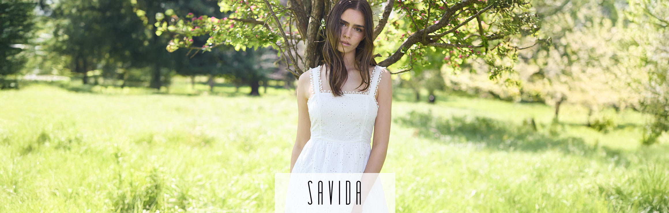 Featured Savida sleeveless neutral suit – summer flattering styles