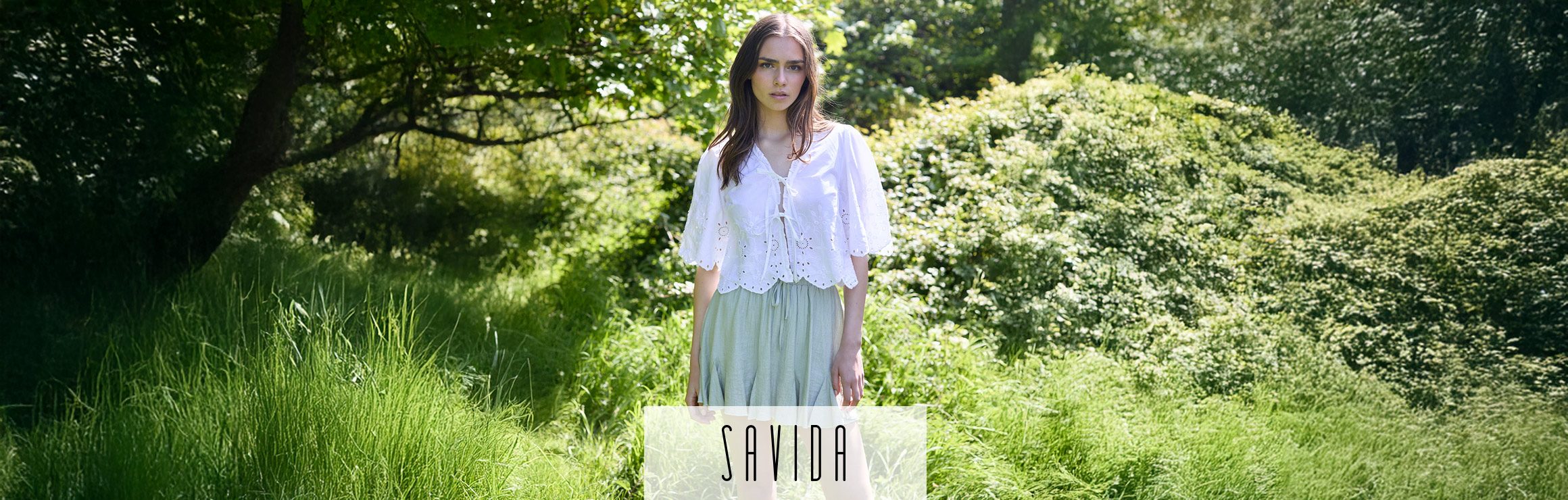 Featured Savida sleeveless neutral suit – summer flattering styles